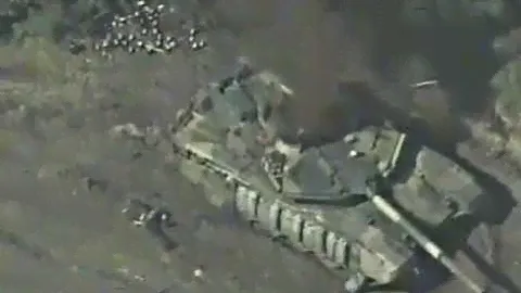 A Russian T-90M tank destroyed by a Franco-Swedish 155mm BONUS artillery shell